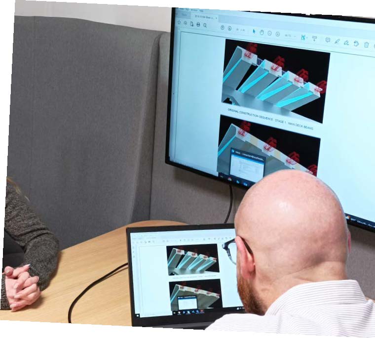 A person working on a CAD image.